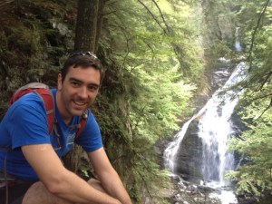 The author with backpack and waterfall.